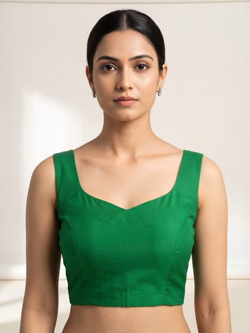 Green premium silk plain padded sleeveless saree blouse with boat neck
