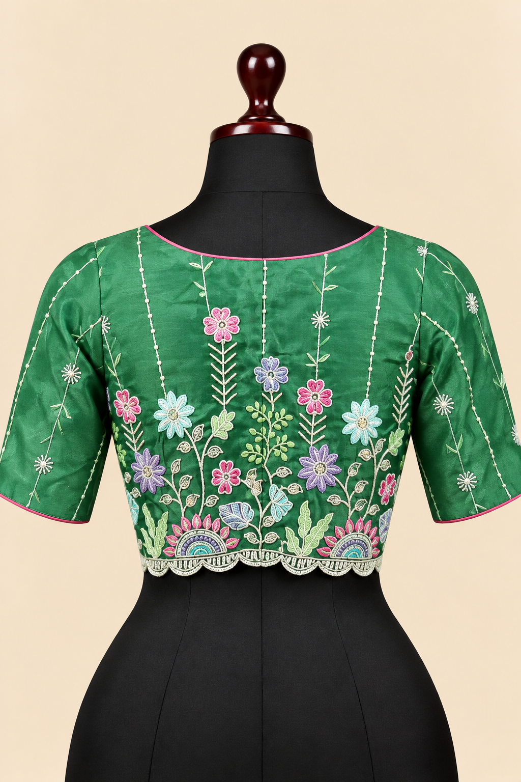 Green satin silk embroidered readymade blouse - back view with multicolour floral embroidery and scalloped hem