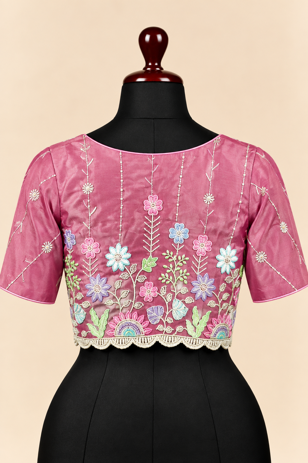 Pink satin silk embroidered readymade blouse - back view with multicolour floral embroidery and scalloped hem
