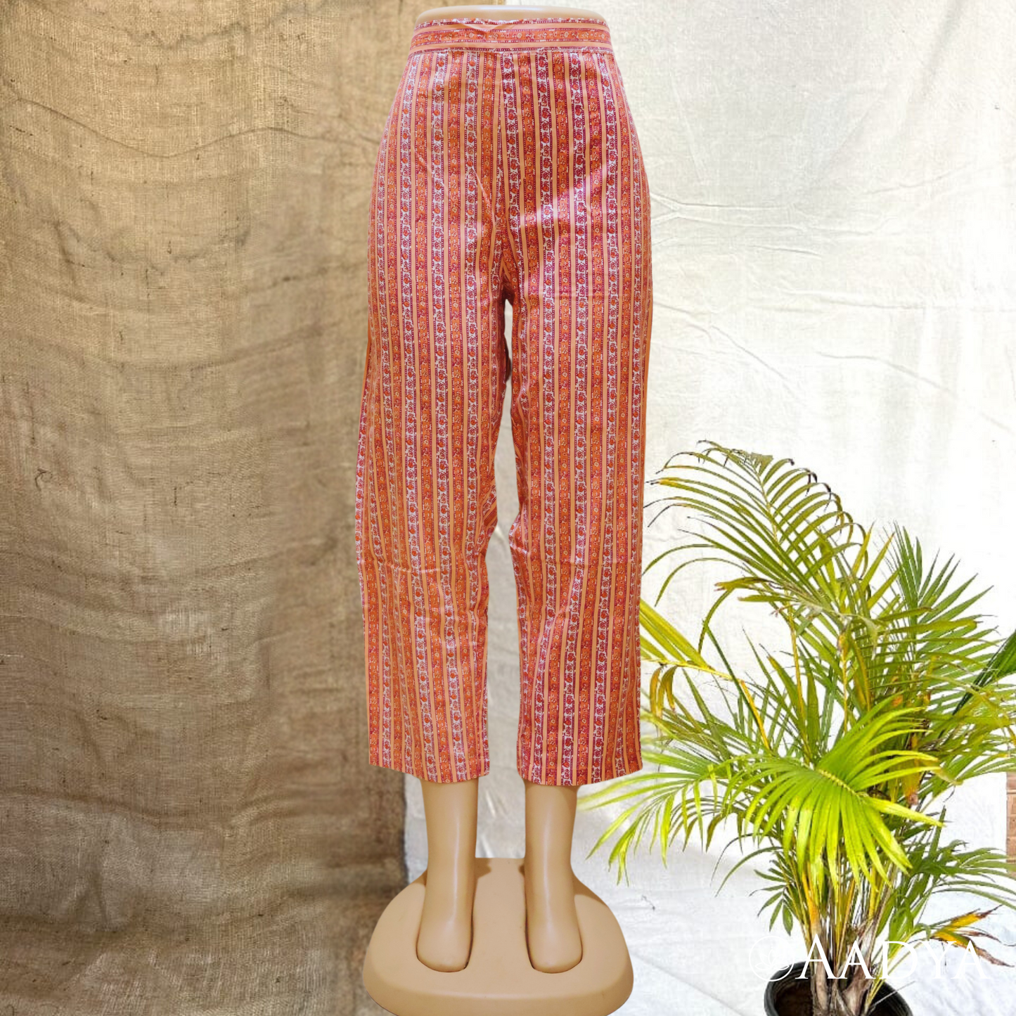 Peach and Orange Floral printed Stripes pant.